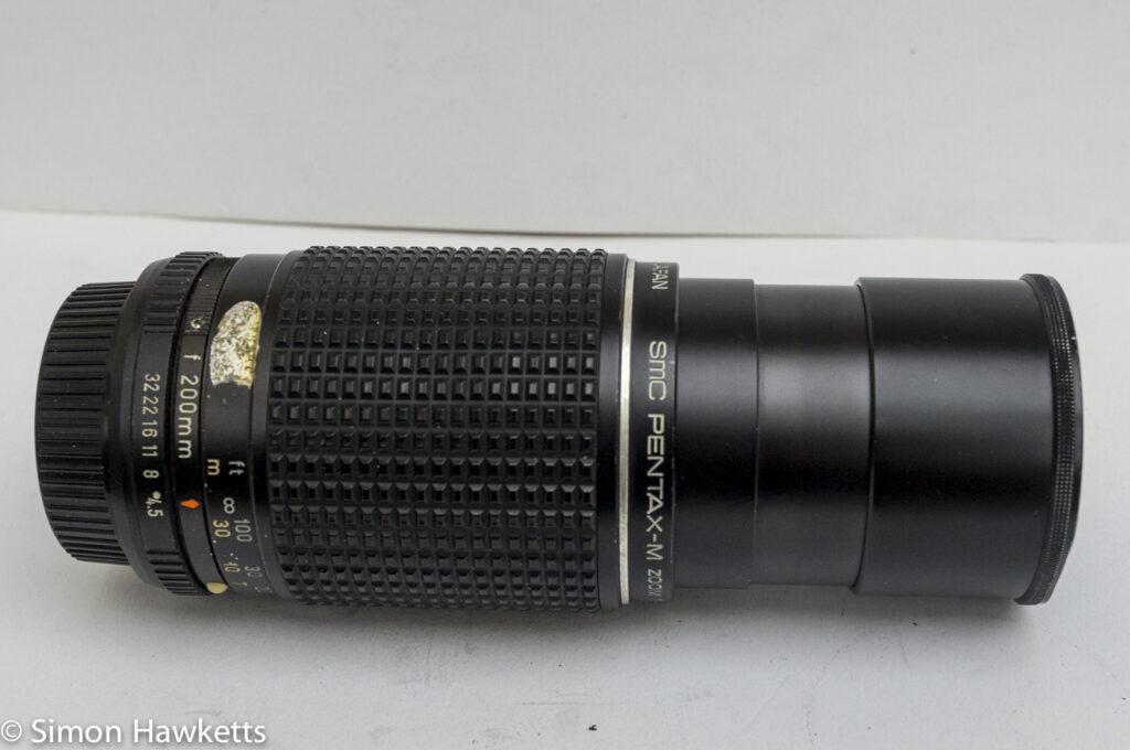 pentax m smc 80 200mm f 4 5 zoom lens with lens hood extended