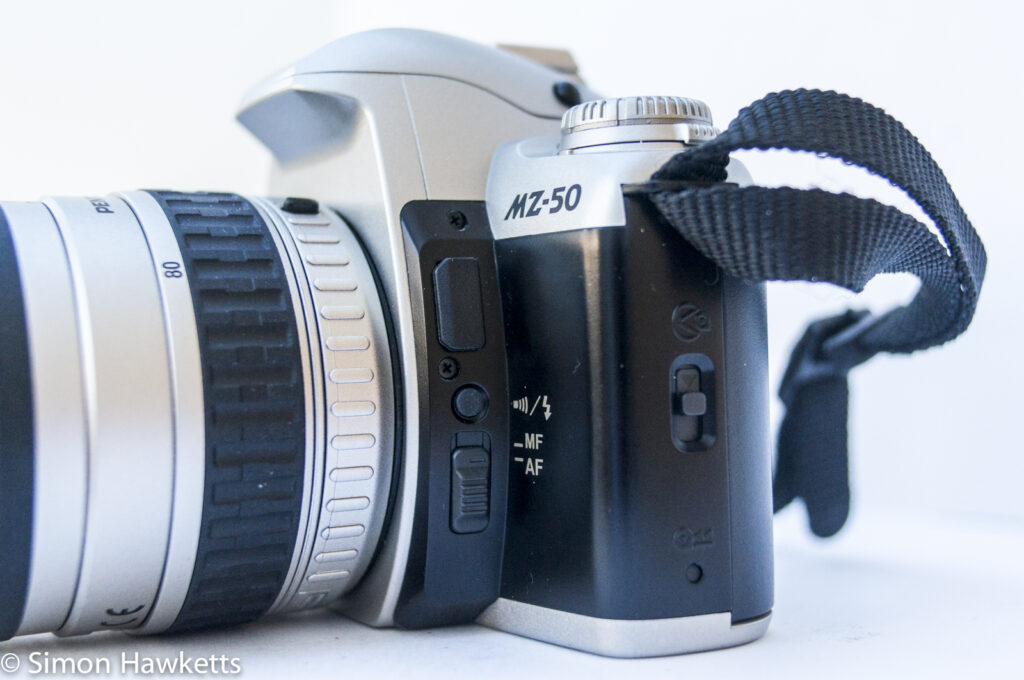 Pentax MZ-50 auto focus 35mm slr showing auto focus / manual focus switch