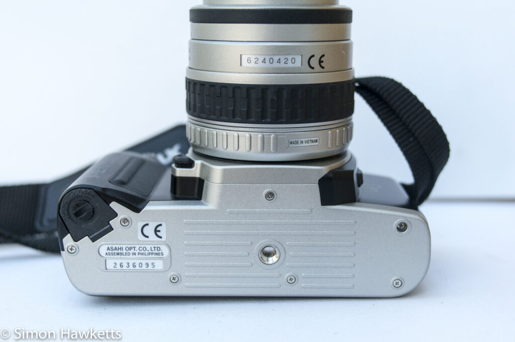 Pentax MZ-50 auto focus 35mm slr showing battery compartment and tripod mount