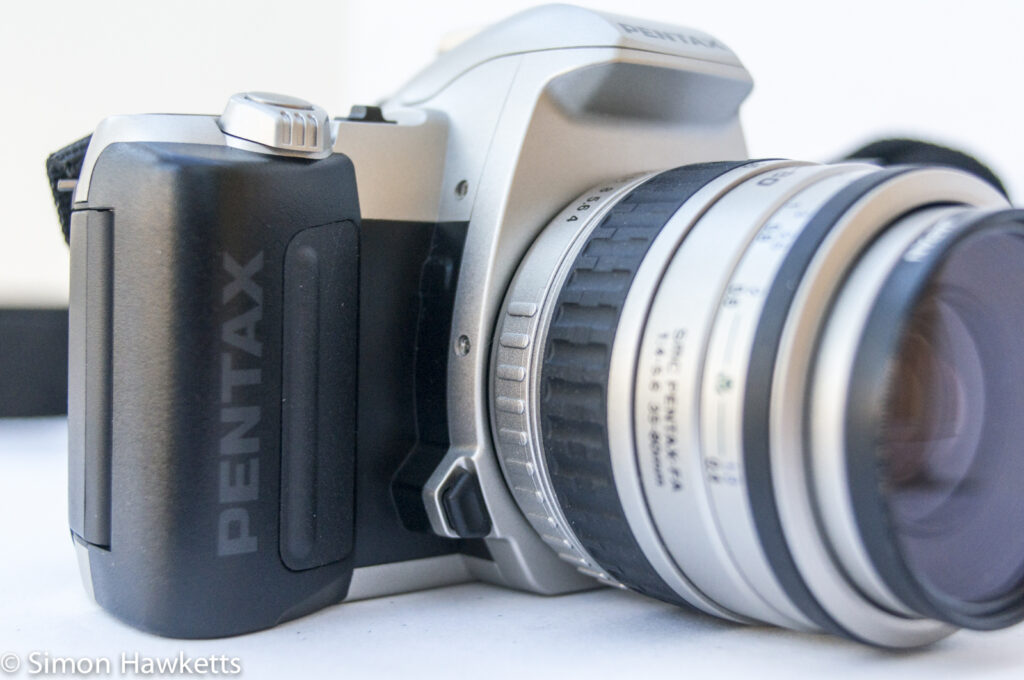 Pentax MZ-50 auto focus 35mm slr showing lens release