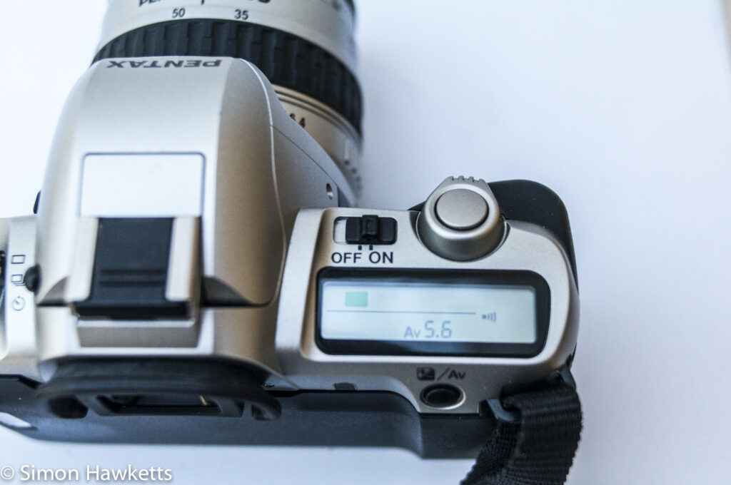 Pentax MZ-50 auto focus 35mm slr showing top LCD and on/off switch