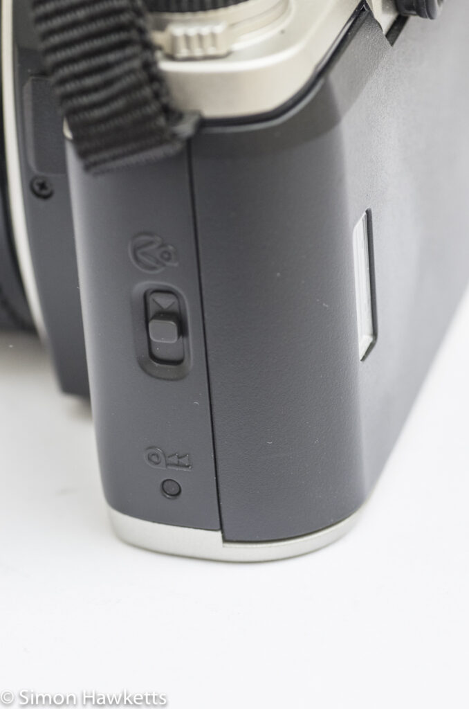 Pentax MZ-M 35mm manual focus slr showing door release and mid-roll rewind