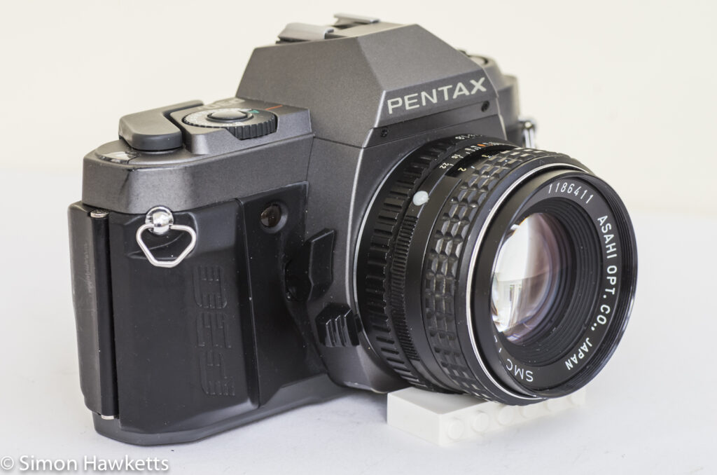 pentax p30t manual focus 35mm slr side view showing dof preview and lens release