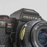 pentax program a 35mm slr camera front view with 28mm smc pentax m f 2 8