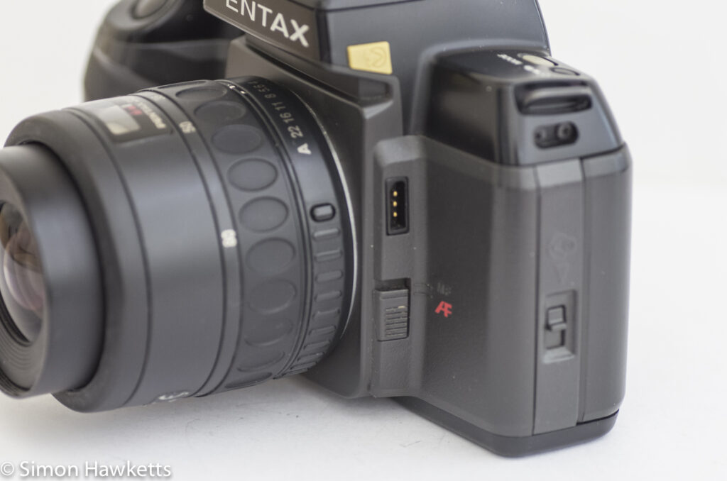 pentax sf 10 35mm slr showing mf af switch cable release socket and flash release button