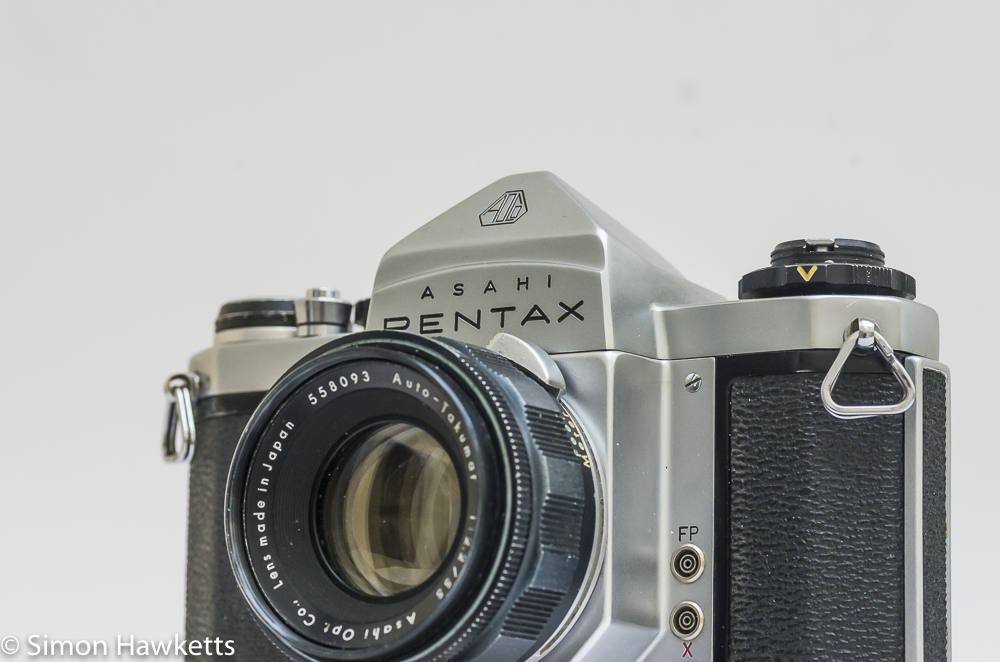 Pentax SV 35mm camera with lens