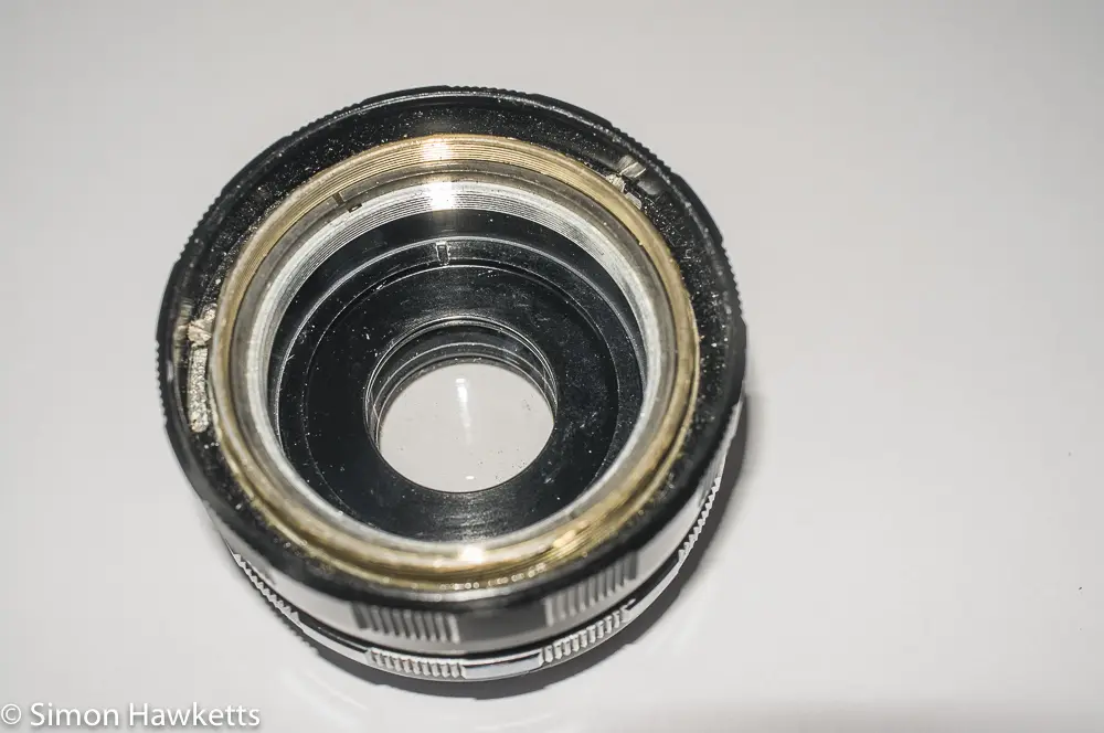 Petri 55mm f/2 CC lens showing aperture retaining plate