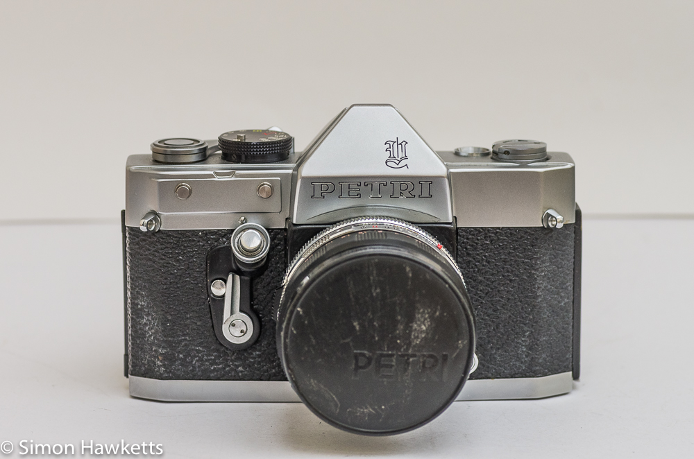 Petri Penta V6 35mm camera - front view with lens and lens cap on