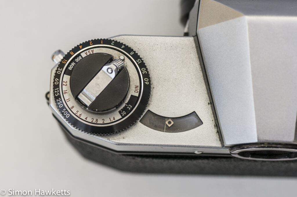 Praktica Nova 1B 35mm slr showing light meter and rewind knob