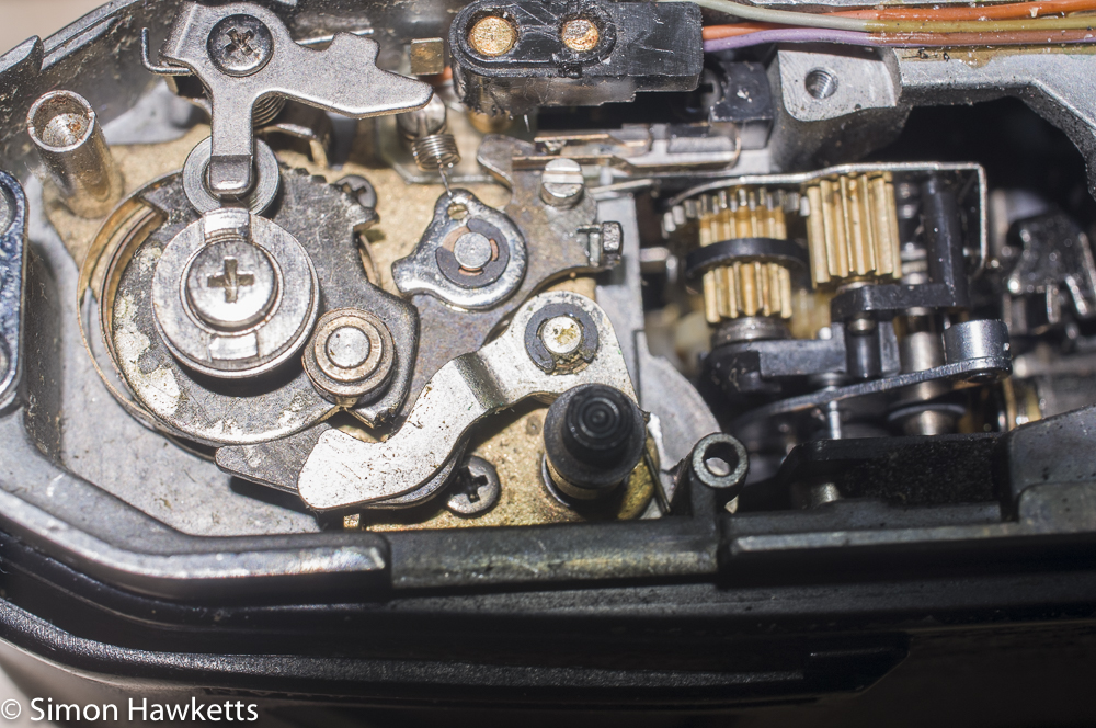 repairing a pentax me mechanism to refit the shutter linkage on for the pentax super program
