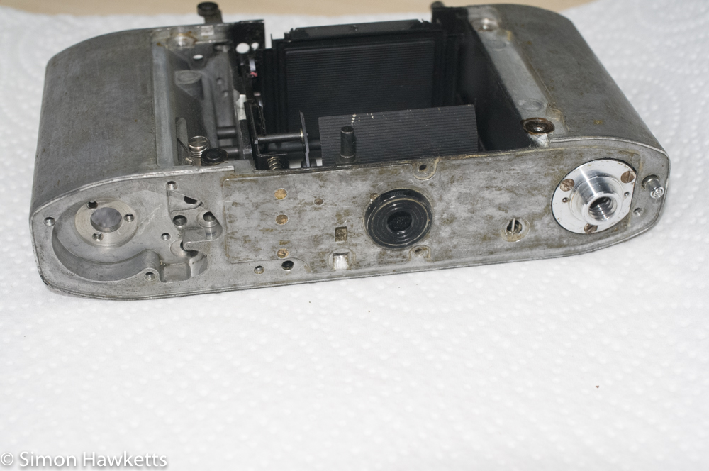 Kodak Retina Reflex S film advance re-assembly - base and shell cleaned