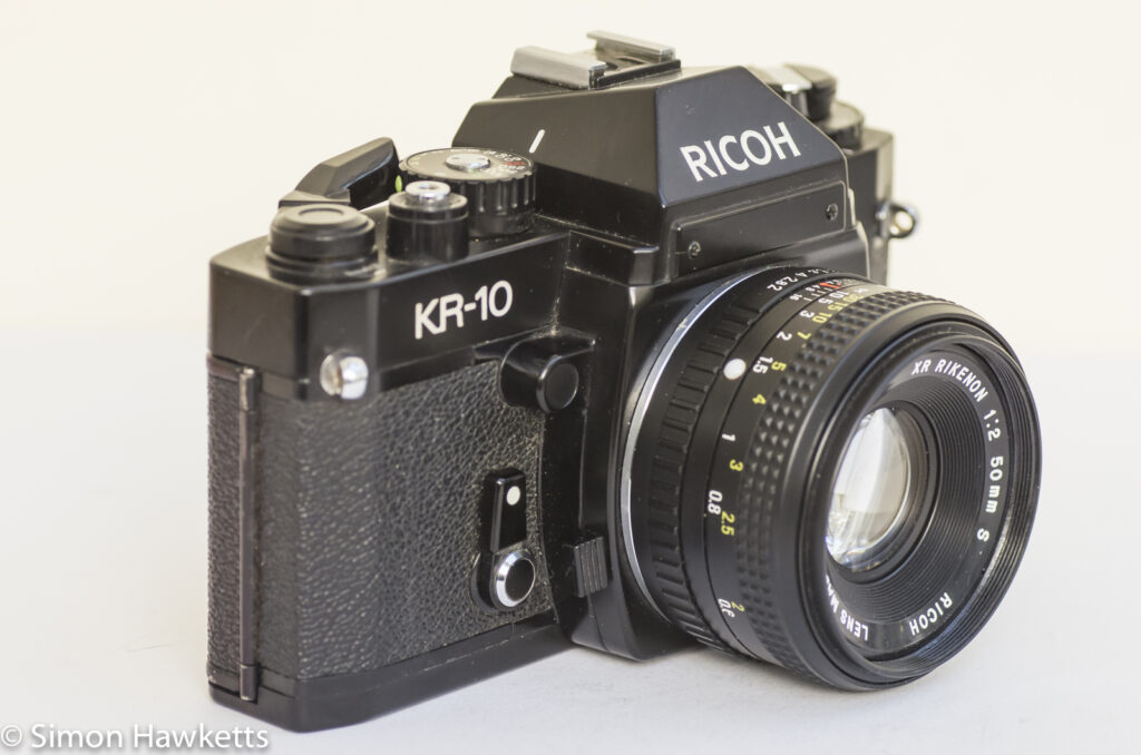 Ricoh KR-10 35mm SLR side view showing self timer and lens release