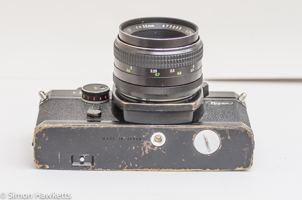 Ricoh Singlex TLS 35mm single lens reflex camera showing tripod bush and battery compartment