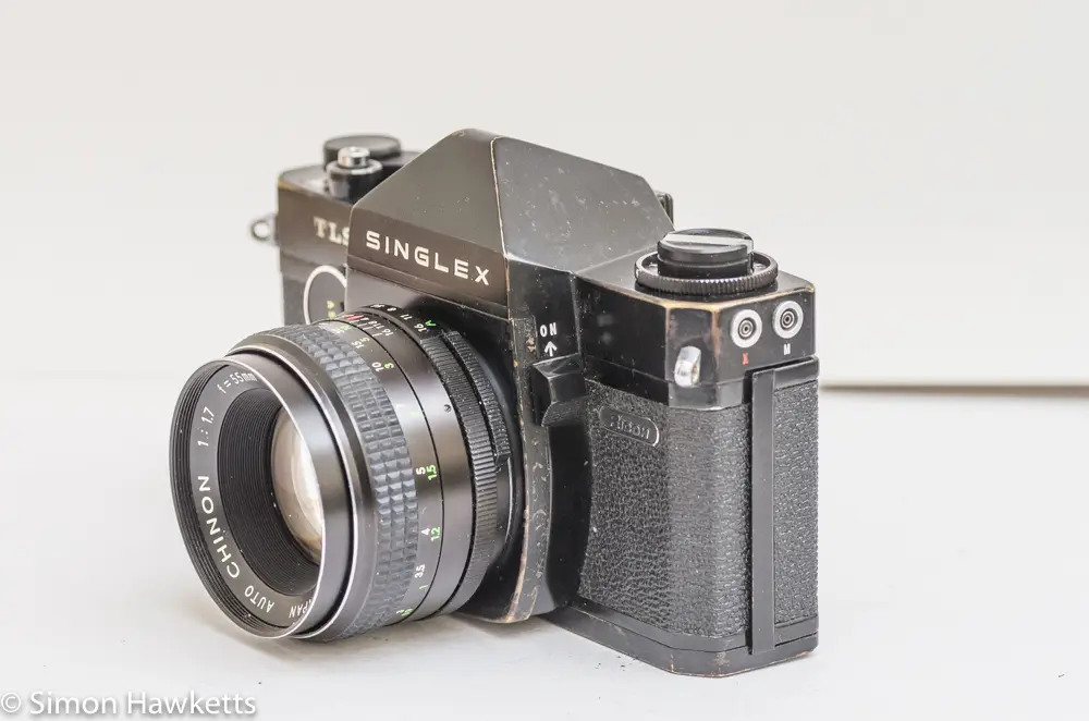 Ricoh Singlex TLS 35mm single lens reflex camera side view showing exposure measuring switch and flash sync sockets