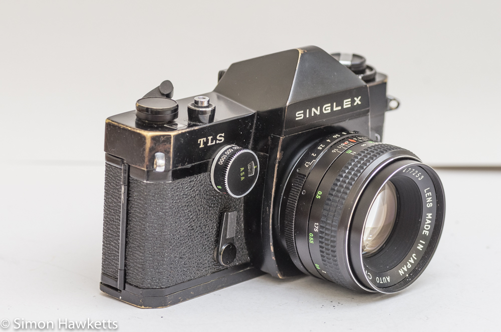 Ricoh Singlex TLS 35mm single lens reflex camera side view showing shutter speed control and self timer