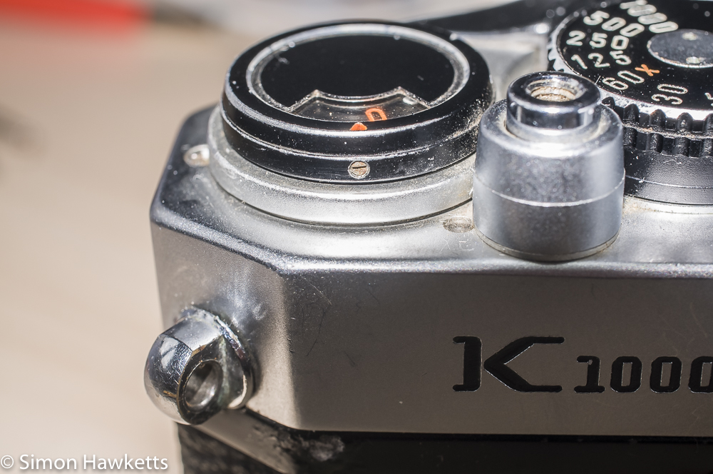 Second screw to loosen during Pentax K1000 top plate removal