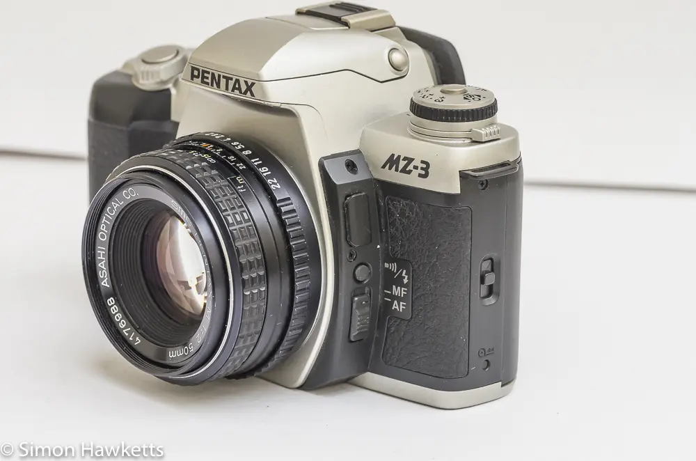 side view of pentax mz 3 showing the af mf switch remote socket and rear door release