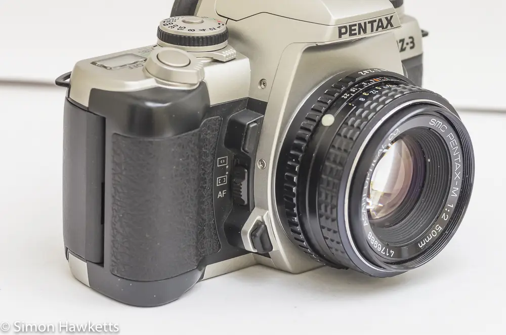 side view of pentax mz 3 showing the af selector depth of field preview and lens release
