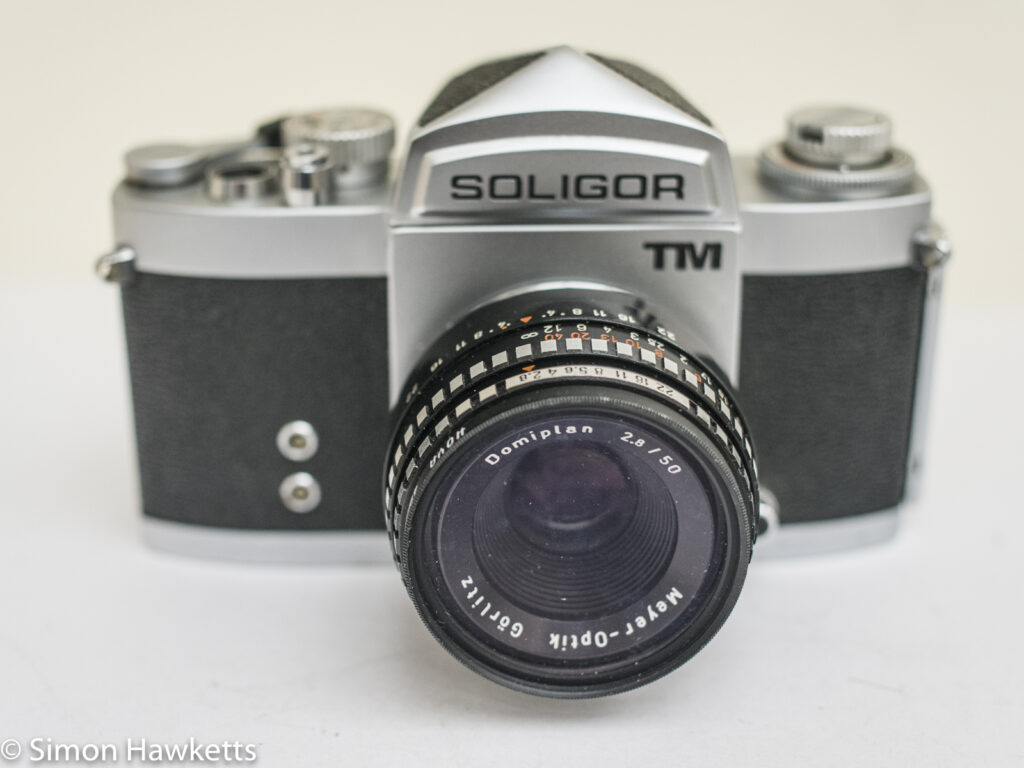 soligor tm 35mm slr camera showing front view