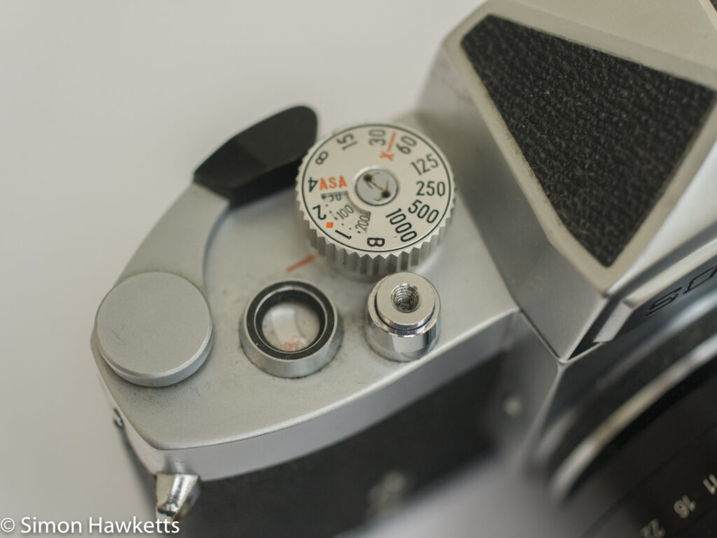 soligor tm 35mm slr camera showing shutter speed film advance and release