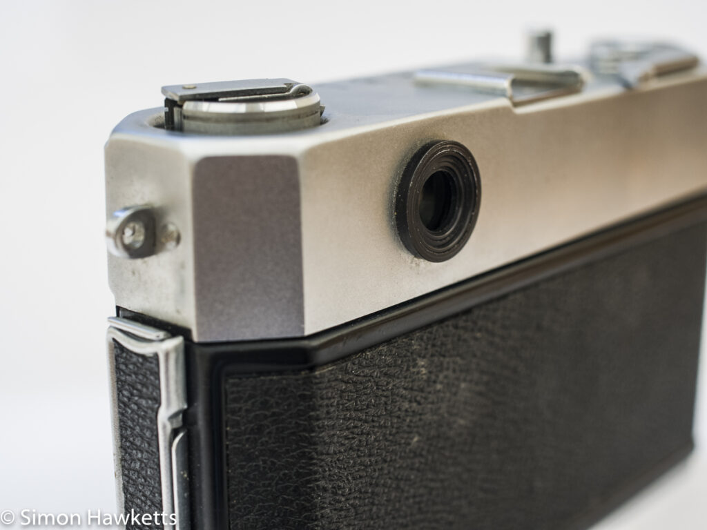 Taron Vr 35mm rangefinder camera showing door release and viewfinder