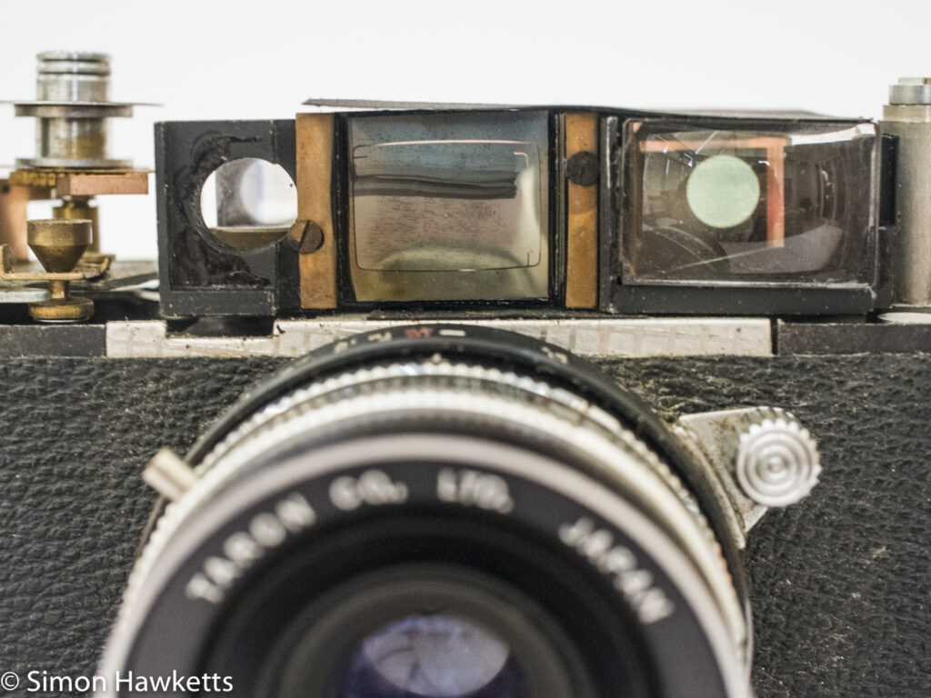 Taron Vr 35mm rangefinder camera showing glass removed from rangefinder