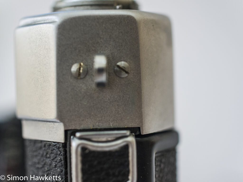 Taron Vr 35mm rangefinder camera showing screws holding top cover