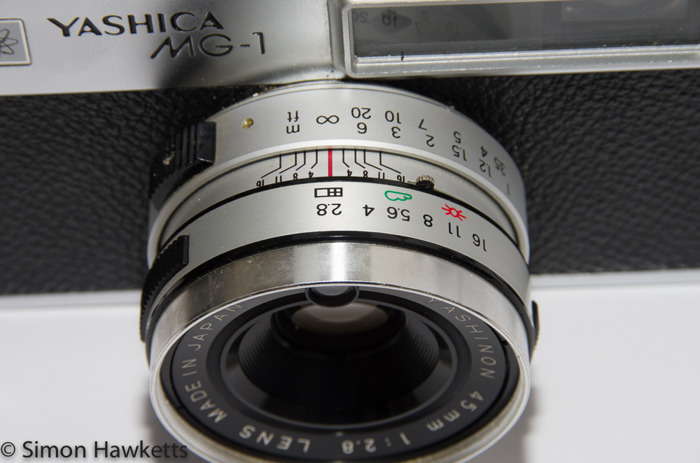 Yashica MG-1 - Lens showing aperture and focus adjustment