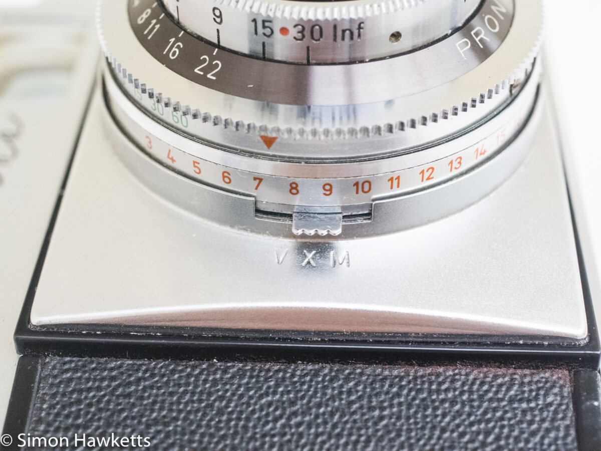 Zeiss Ikon Contina 35mm viewfinder camera showing flash sync and self timer