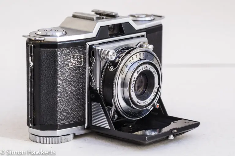 Zeiss Ikon Contina I 35mm viewfinder folding camera - side view showing shutter release