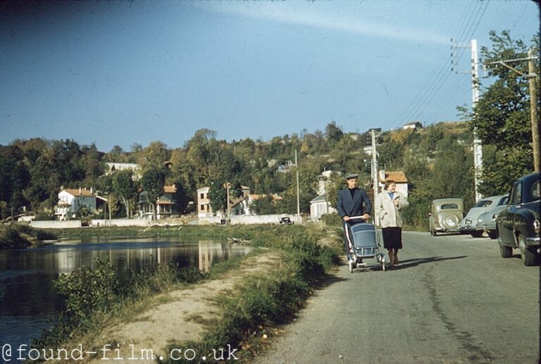 Couple pushing a baby in a pram