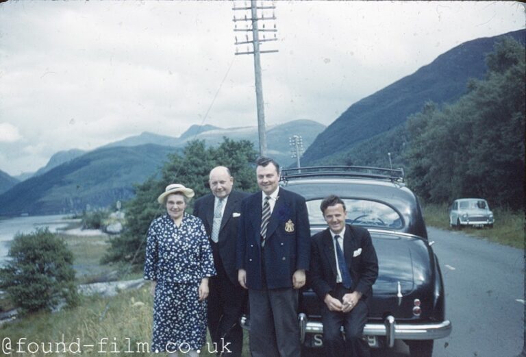 Family portrait with car