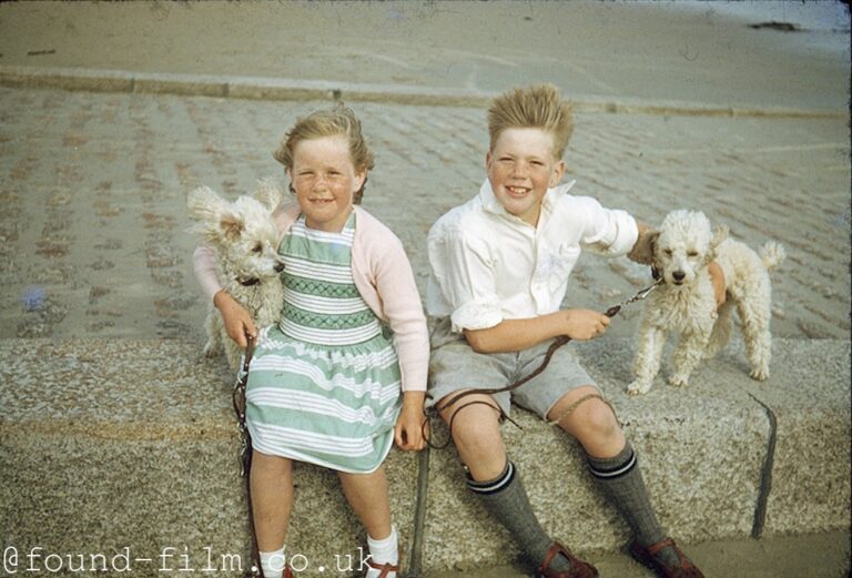 Sister and Brother with their dogs