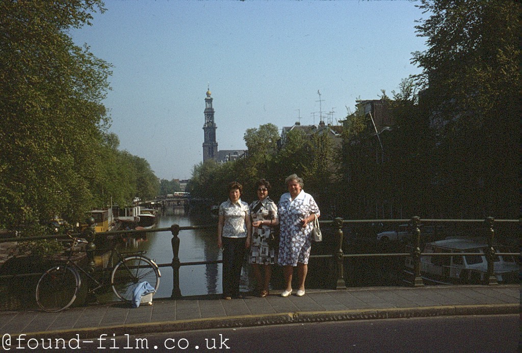 Three women standing on a bride in Amsterdam - May 1976
