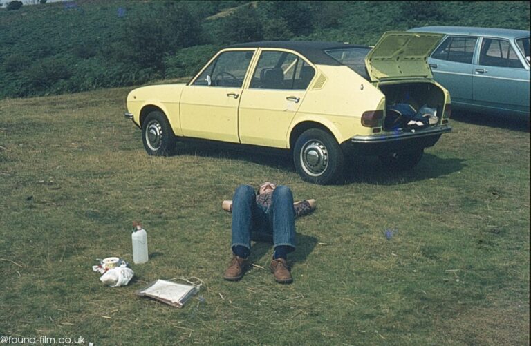 A man with his Morris Marina