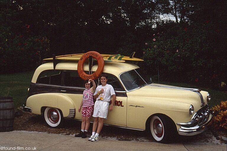 Two children next to a yellow station waggon – Aug 1993