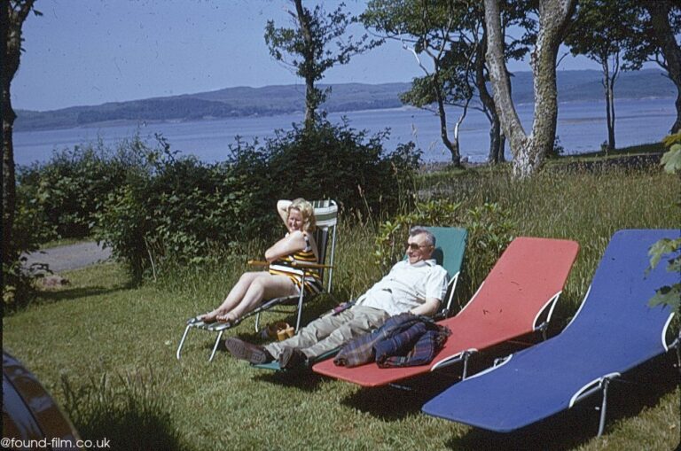 Holidaymakers relaxing on deckchairs – October 1975